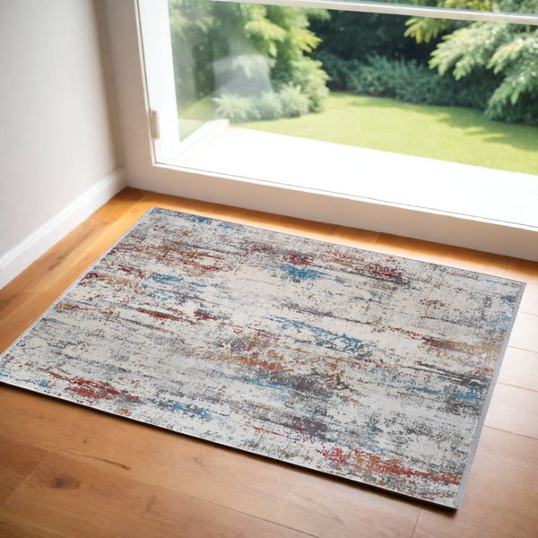 HomeRoots 3' Gray Blue and Red Abstract Power Loom Area Rug with Tassels - Elevate Your Space Instantly! 2' X 3' 566071