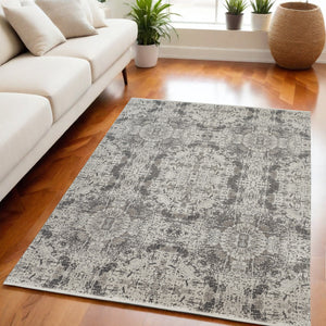 Homeroots 5' X 8' Ivory Taupe And Gray Abstract Power Loom Distressed Area Rug With Fringe Gray Viscose 566073