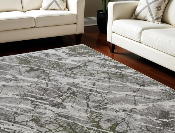HomeRoots 3' Modern Abstract Taupe and Gray Power Loom Area Rug with Stylish Fringe for Any Room Decor 7' X 10' 566097