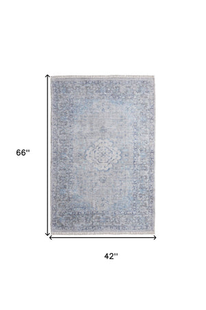 HomeRoots 4' Hand-Woven Distressed Oriental Area Rug in Gray, Blue, and Ivory with Classic Fringe Detail 4' X 6' 566157