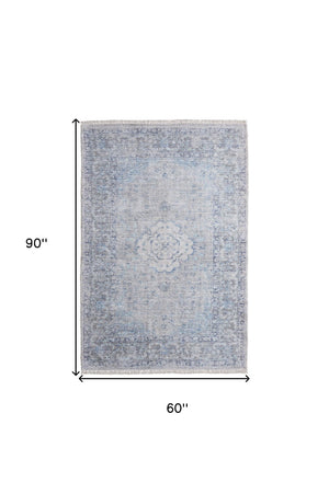HomeRoots 4' Hand-Woven Distressed Oriental Area Rug in Gray, Blue, and Ivory with Classic Fringe Detail 5' X 8' 566158