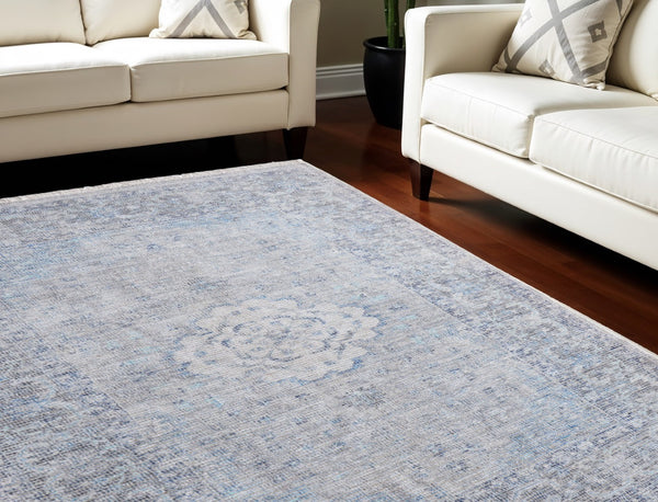 HomeRoots 4' Hand-Woven Distressed Oriental Area Rug in Gray, Blue, and Ivory with Classic Fringe Detail 8' X 10' 566159