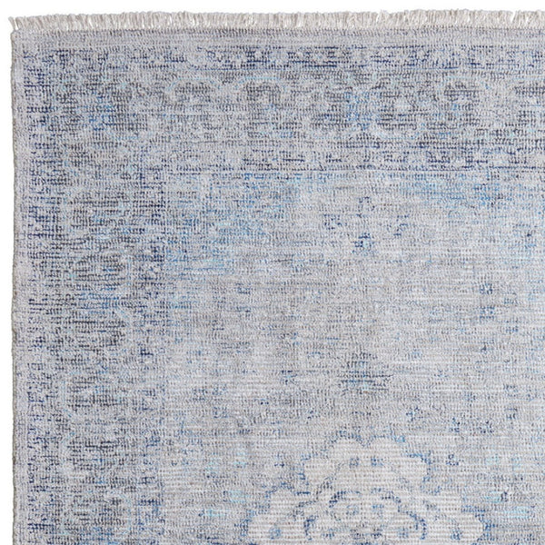 HomeRoots 4' Hand-Woven Distressed Oriental Area Rug in Gray, Blue, and Ivory with Classic Fringe Detail 8' X 10' 566159