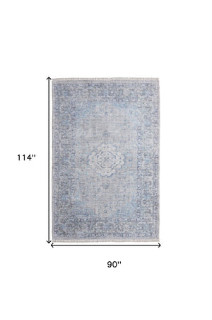 HomeRoots 4' Hand-Woven Distressed Oriental Area Rug in Gray, Blue, and Ivory with Classic Fringe Detail 8' X 10' 566159
