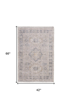 HomeRoots 4' Hand Woven Tan and Gray Oriental Area Rug - Vintage Charm with Distressed Design and Fringe 4' X 6' 566169