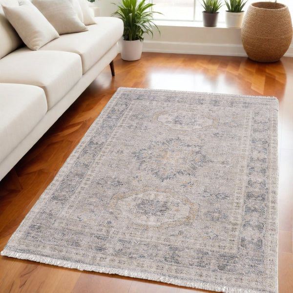 HomeRoots 4' Hand Woven Tan and Gray Oriental Area Rug - Vintage Charm with Distressed Design and Fringe 5' X 8' 566170