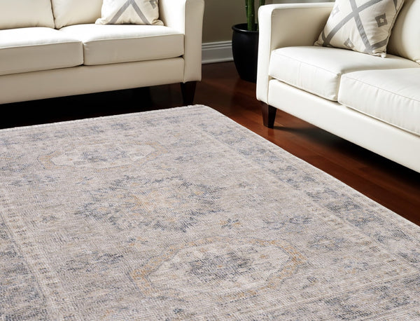 HomeRoots 4' Hand Woven Tan and Gray Oriental Area Rug - Vintage Charm with Distressed Design and Fringe 8' X 10' 566171