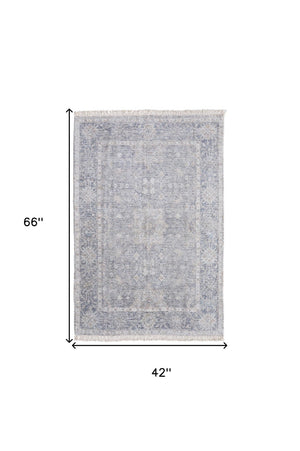 HomeRoots 4' Hand-Woven Abstract Area Rug in Gray-Blue and Taupe - Distressed Design with Fringed Edges 4' X 6' 566175