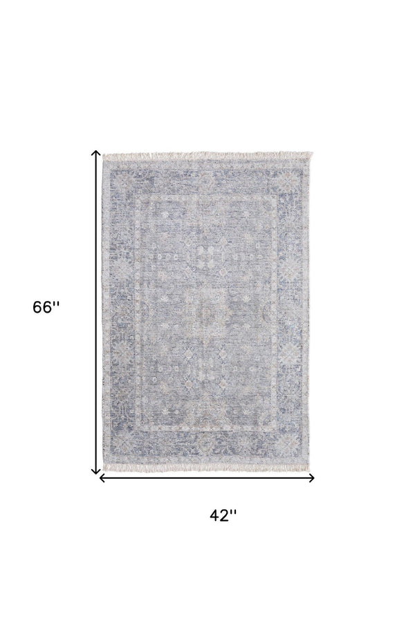 HomeRoots 4' Hand-Woven Abstract Area Rug in Gray-Blue and Taupe - Distressed Design with Fringed Edges 4' X 6' 566175