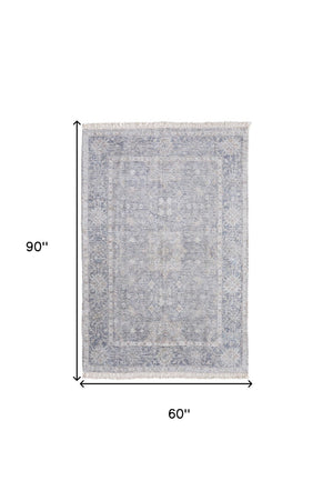 HomeRoots 4' Hand-Woven Abstract Area Rug in Gray-Blue and Taupe - Distressed Design with Fringed Edges 5' X 8' 566176