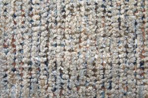 HomeRoots 4' Hand-Woven Abstract Area Rug in Gray-Blue and Taupe - Distressed Design with Fringed Edges 9' X 12' 566178
