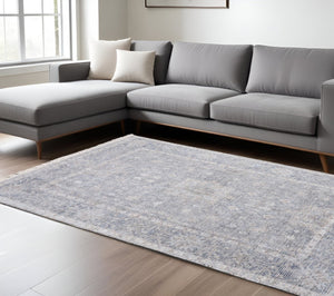 HomeRoots 4' Hand-Woven Abstract Area Rug in Gray-Blue and Taupe - Distressed Design with Fringed Edges 10' X 14' 566179