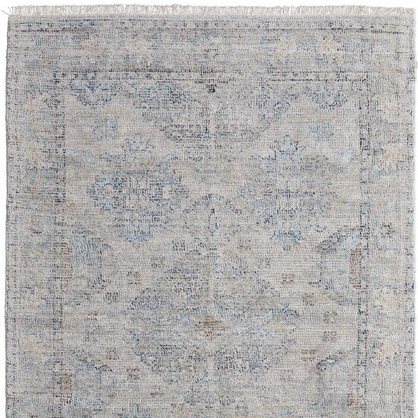 HomeRoots 4' Gray Blue and Taupe Hand-Woven Distressed Area Rug with Fringe for Timeless Home Elegance 4' X 6' 566181
