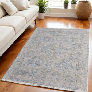 HomeRoots 4' Gray Blue and Taupe Hand-Woven Distressed Area Rug with Fringe for Timeless Home Elegance 5' X 8' 566182