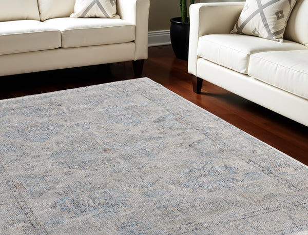 HomeRoots 4' Gray Blue and Taupe Hand-Woven Distressed Area Rug with Fringe for Timeless Home Elegance 9' X 12' 566184
