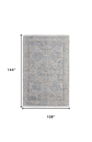 HomeRoots 4' Gray Blue and Taupe Hand-Woven Distressed Area Rug with Fringe for Timeless Home Elegance 9' X 12' 566184