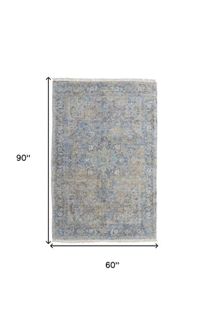 HomeRoots 4' Hand-Woven Distressed Area Rug in Gray Blue and Tan with Artistic Fringe for Modern Spaces 5' X 8' 566188