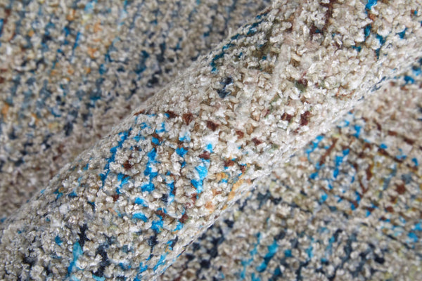 HomeRoots 4' Hand-Woven Distressed Area Rug in Gray Blue and Tan with Artistic Fringe for Modern Spaces 9' X 12' 566190