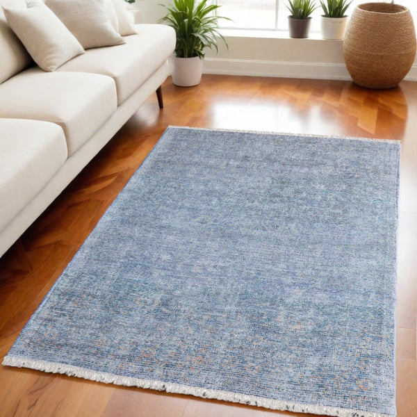 HomeRoots 5' Hand Woven Blue and Gray Abstract Area Rug with Distressed Finish and Stylish Fringed Edges 5' X 8' 566193