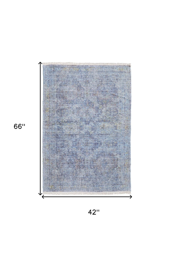 HomeRoots 4' Blue and Ivory Abstract Hand-Woven Area Rug with Fringed Tassels – Unique Distressed Design 4' X 6' 566198