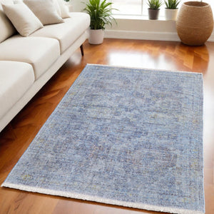 HomeRoots 4' Blue and Ivory Abstract Hand-Woven Area Rug with Fringed Tassels – Unique Distressed Design 5' X 8' 566199