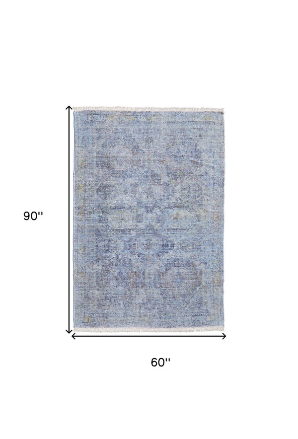 HomeRoots 4' Blue and Ivory Abstract Hand-Woven Area Rug with Fringed Tassels – Unique Distressed Design 5' X 8' 566199
