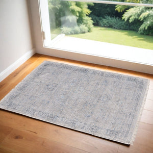 HomeRoots 4' Hand-Woven Distressed Area Rug in Gray-Blue & Taupe - Unique Abstract Design with Fringe 4' X 6' 566204