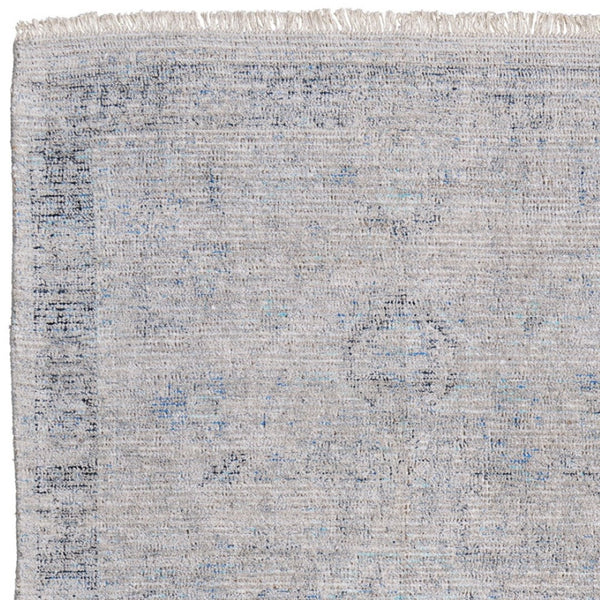 HomeRoots 4' Hand-Woven Distressed Area Rug in Gray-Blue & Taupe - Unique Abstract Design with Fringe 5' X 8' 566205