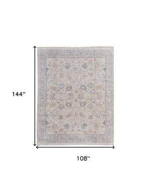 HomeRoots 4' Hand-Woven Distressed Floral Area Rug in Ivory Tan and Blue with Tasseled Fringe for Elegance 9' X 12' 566213