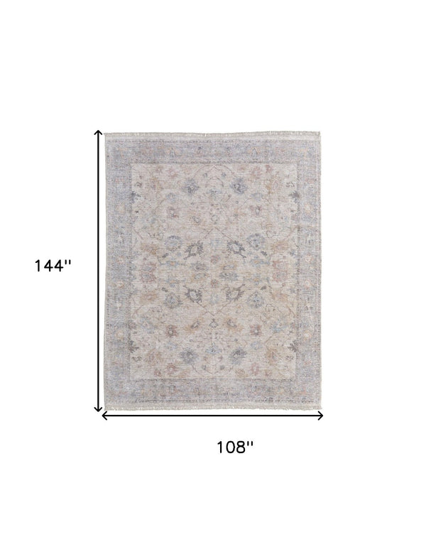 HomeRoots 4' Hand-Woven Distressed Floral Area Rug in Ivory Tan and Blue with Tasseled Fringe for Elegance 9' X 12' 566213
