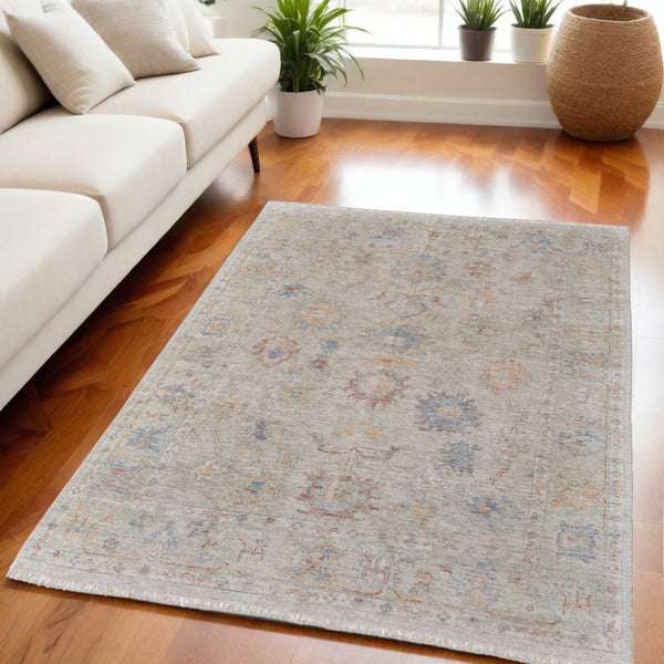 Homeroots 5' X 8' Tan Brown And Blue Floral Hand Woven Distressed Area Rug With Fringe Brown Wool Blend 566223