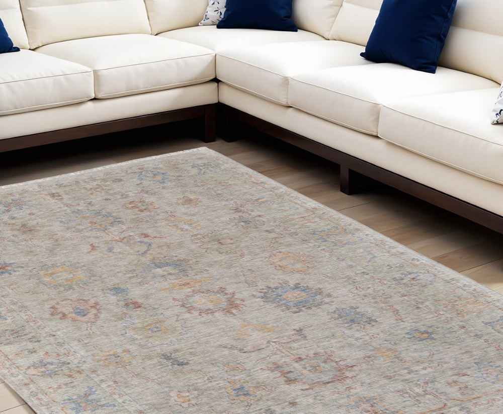 HomeRoots 4' Hand Woven Distressed Floral Area Rug in Tan and Blue—Vintage Charm for Any Room Decor 8' X 10' 566224