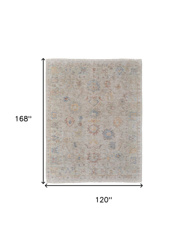 Homeroots 10' X 14' Tan Brown And Blue Floral Hand Woven Distressed Area Rug With Fringe Brown Wool Blend 566226