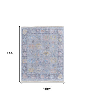 HomeRoots 4' Hand Woven Distressed Floral Area Rug in Orange, Blue & Gold - Vintage Charm with Fringe Edges 9' X 12' 566231