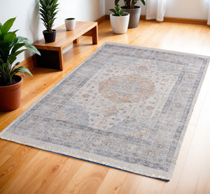 HomeRoots 4' Hand-Woven Ivory Blue Orange Oriental Area Rug with Distressed Finish and Elegant Fringe Detail 4' X 6' 566234