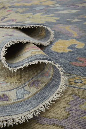 HomeRoots 4' Hand-Knotted Wool Oriental Area Rug in Rich Gold, Blue, and Purple - Timeless Elegance for Any Room 6' X 9' 566241