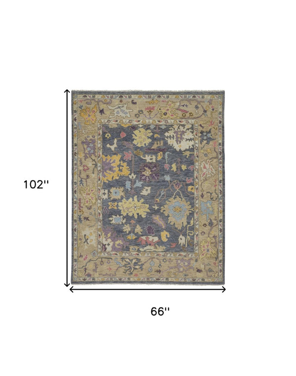 HomeRoots 4' Hand-Knotted Wool Oriental Area Rug in Rich Gold, Blue, and Purple - Timeless Elegance for Any Room 6' X 9' 566241