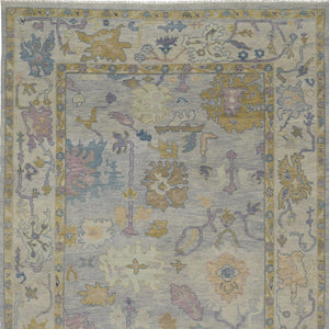 HomeRoots 4' Hand-Knotted Wool Oriental Area Rug in Rich Gold, Blue, and Purple - Timeless Elegance for Any Room 9' X 13' 566252