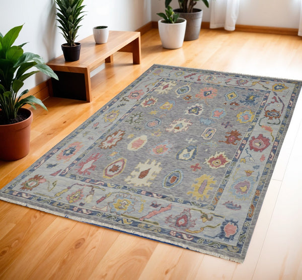 HomeRoots 4' Hand-Knotted Wool Oriental Area Rug in Gray-Blue and Red with Elegant Tasseled Fringe Design 4' X 6' 566256
