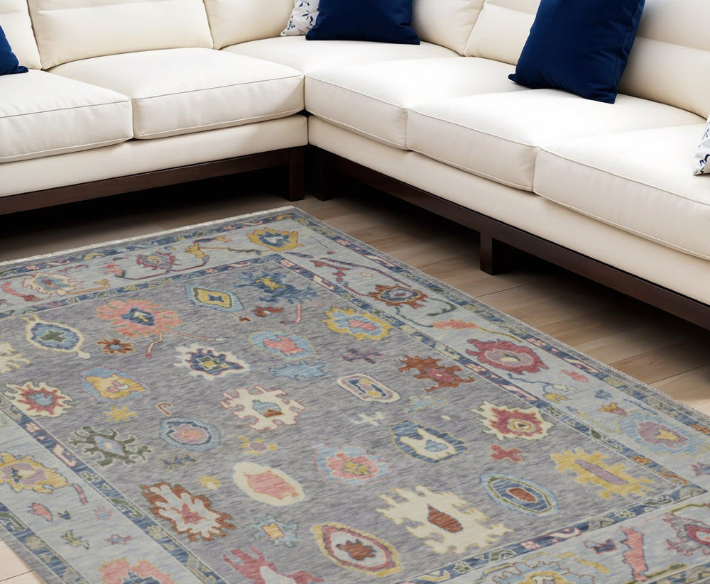 HomeRoots 4' Hand-Knotted Wool Oriental Area Rug in Gray-Blue and Red with Elegant Tasseled Fringe Design 6' X 9' 566257