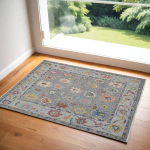 HomeRoots 4' Hand-Knotted Wool Oriental Area Rug in Gray-Blue and Red with Elegant Tasseled Fringe Design 2' X 3' 566263