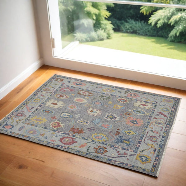 HomeRoots 4' Hand-Knotted Wool Oriental Area Rug in Gray-Blue and Red with Elegant Tasseled Fringe Design 2' X 3' 566263