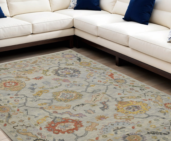 HomeRoots 4' Timeless Gray Red and Yellow Hand-Knotted Wool Oriental Rug with Fringe for Elegant Spaces 6' X 9' 566265