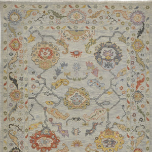 HomeRoots 4' Timeless Gray Red and Yellow Hand-Knotted Wool Oriental Rug with Fringe for Elegant Spaces 6' X 9' 566265