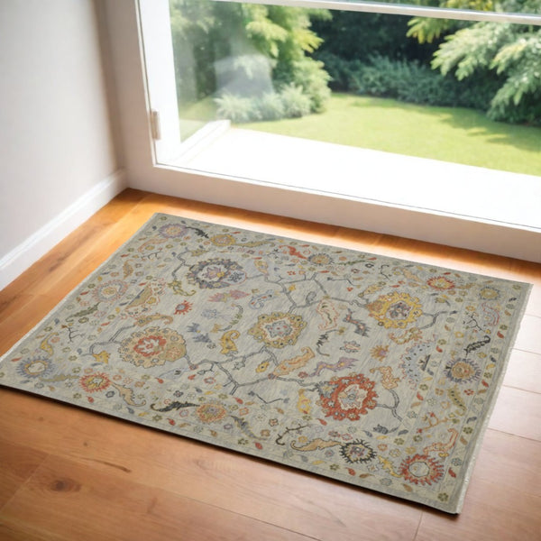 HomeRoots 4' Timeless Gray Red and Yellow Hand-Knotted Wool Oriental Rug with Fringe for Elegant Spaces 2' X 3' 566271