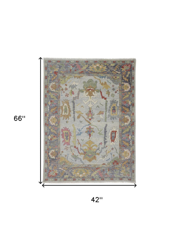HomeRoots 4' Timeless Gray Blue and Gold Hand-Knotted Wool Oriental Area Rug with Artisan Fringed Finish 4' X 6' 566272