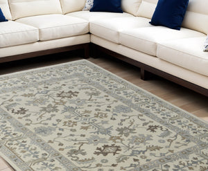 HomeRoots 4' Hand-Knotted Wool Area Rug with Floral Design and Tassel Fringe for Timeless Home Décor 6' X 9' 566287