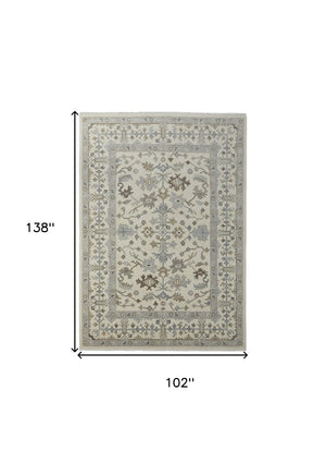 HomeRoots 4' Hand-Knotted Wool Area Rug with Floral Design and Tassel Fringe for Timeless Home Décor 8' X 12' 566289