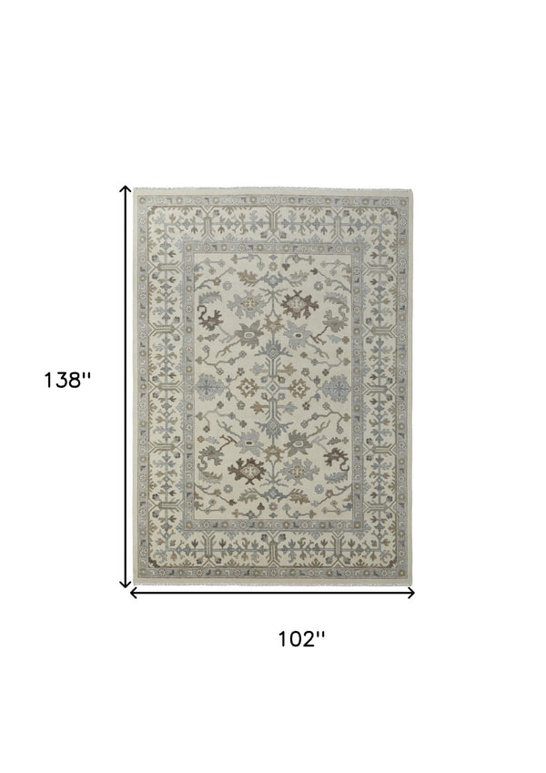 HomeRoots 4' Hand-Knotted Wool Area Rug with Floral Design and Tassel Fringe for Timeless Home Décor 8' X 12' 566289