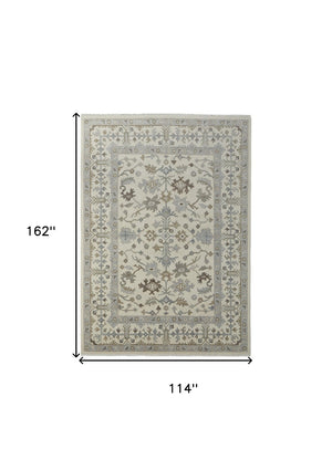 HomeRoots 4' Hand-Knotted Wool Area Rug with Floral Design and Tassel Fringe for Timeless Home Décor 9' X 13' 566290